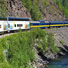 Wilderness Express behind Adventure Class railcars.